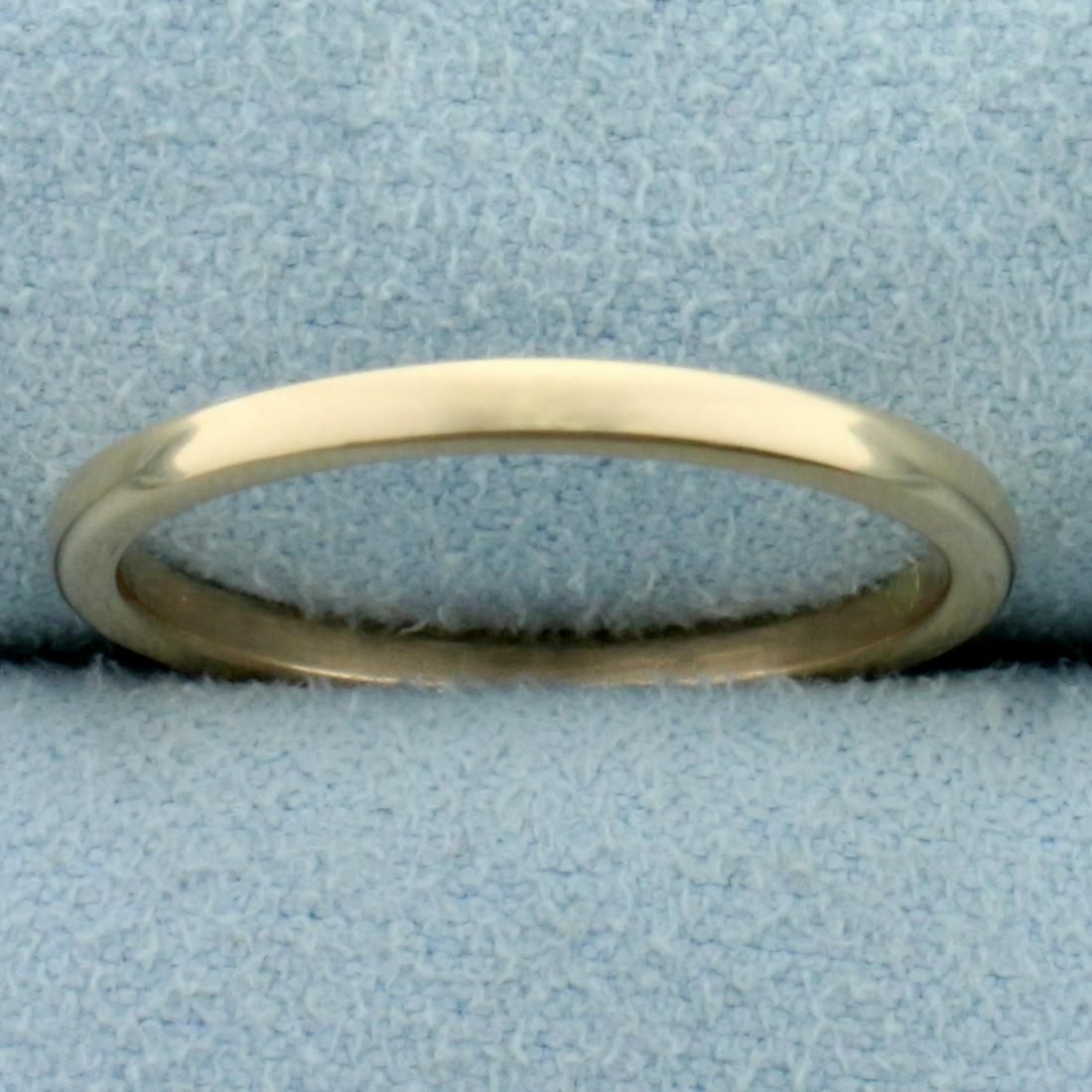 Wedding Band Ring in 14K Yellow Gold: In 14K Yellow Gold. 1.9mm wide. Size 7 3/4. 2.1g.