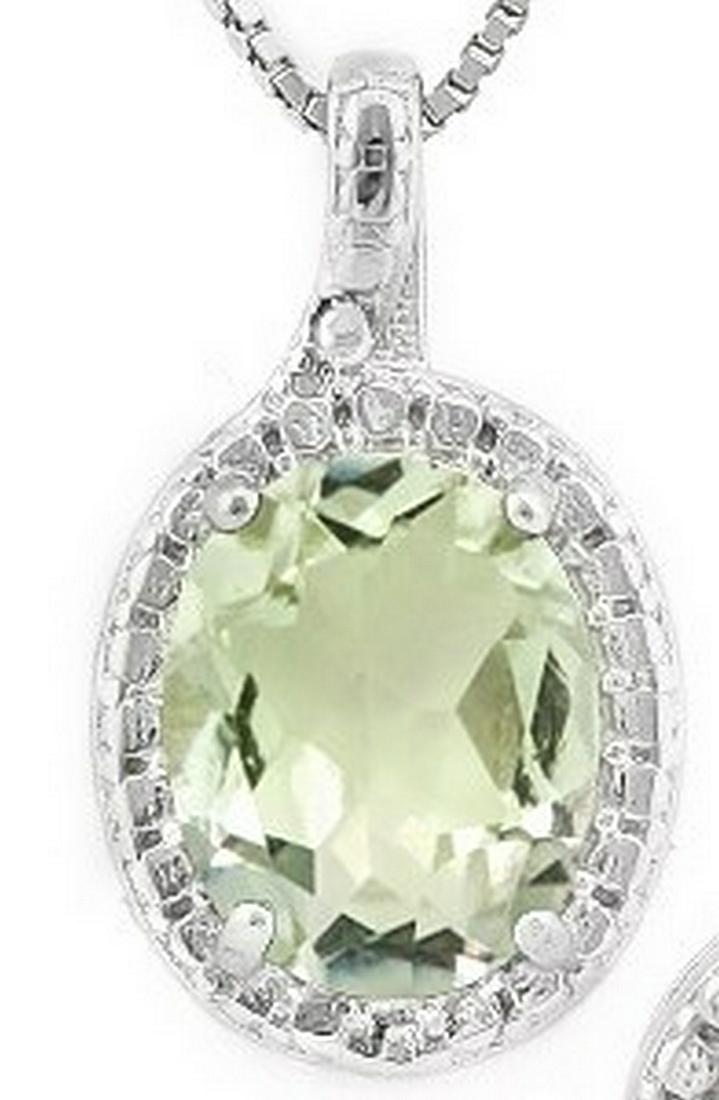 Green Amethyst and Diamond Necklace in Sterling Silver: Contains 1-7x9mm oval cut Green Amethyst gemstone with excellent clarity and green tea color accented with .01ctw genuine diamonds. Measures 5/8" long, set in .925 sterling silver with friction backs.