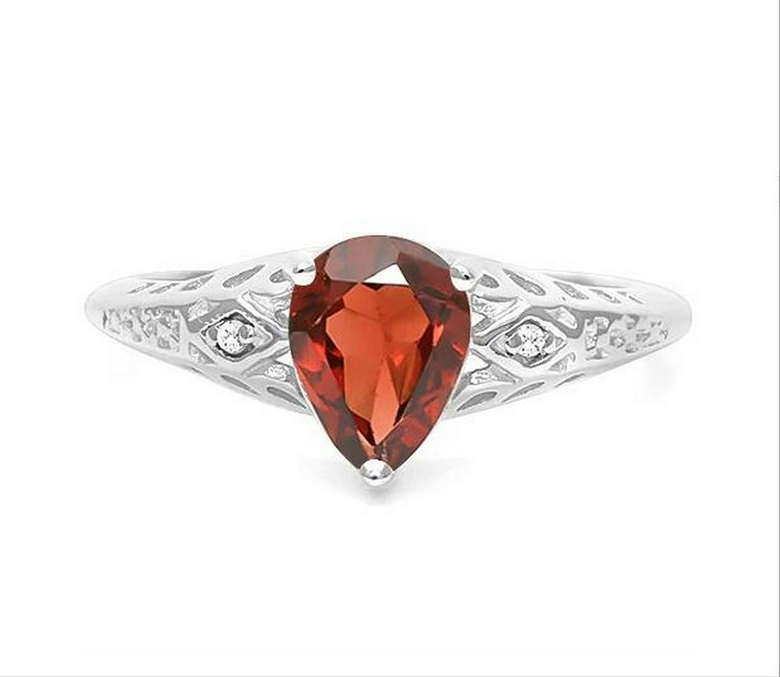 1.2CT Pear Cut Garnet Ring in Sterling Silver: Pear cut 1.21ct genuine garnet gemstone ring with excellent color and clarity. Accented with .01ctw genuine diamonds. Size 7. Set in platinum over .925 sterling silver, 2.0g.