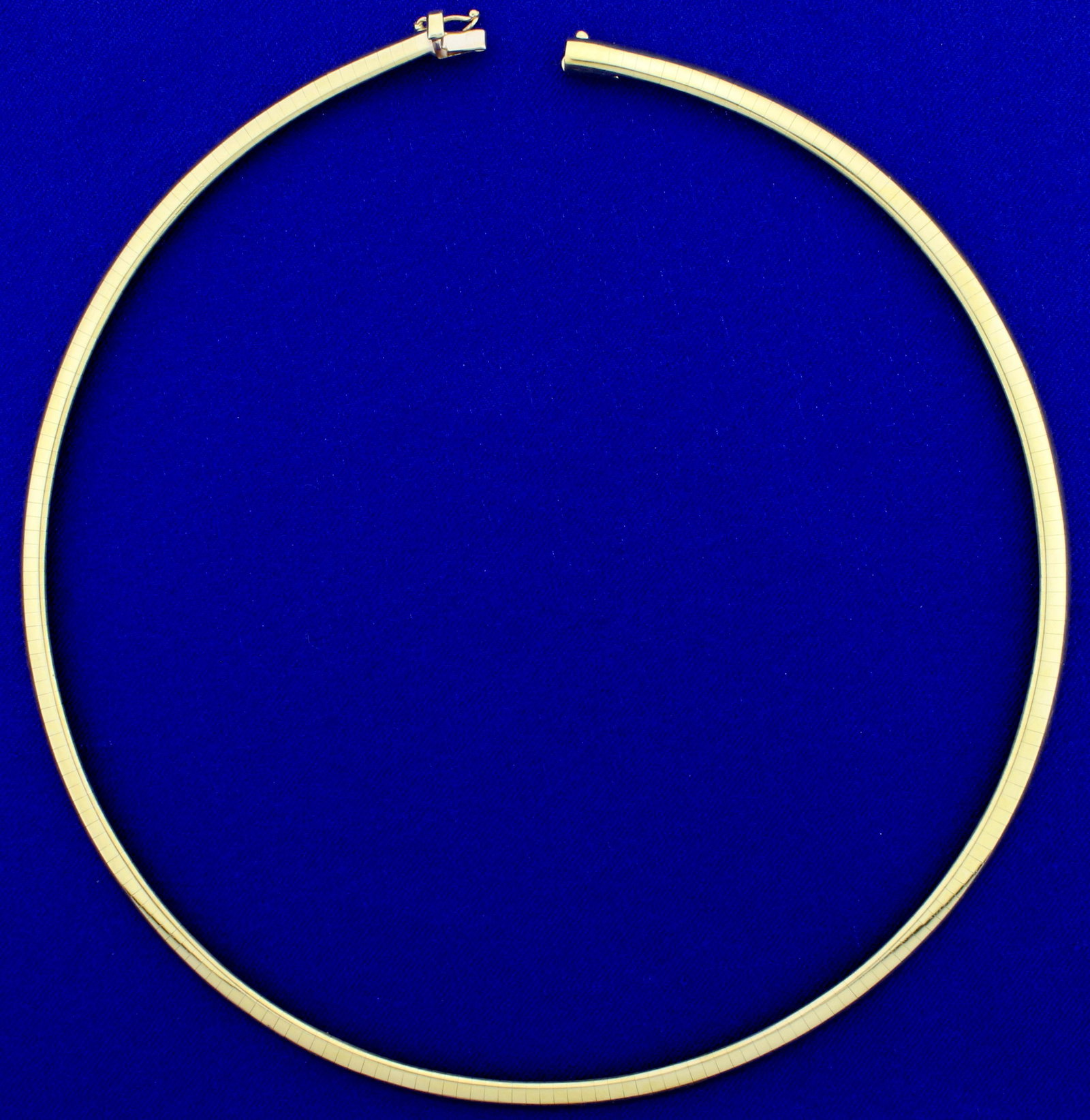 Italian Made 17 Inch Omega Necklace in 18K Yellow Gold: In 18K Yellow Gold. 17 inches long and 5mm wide. 37.5g