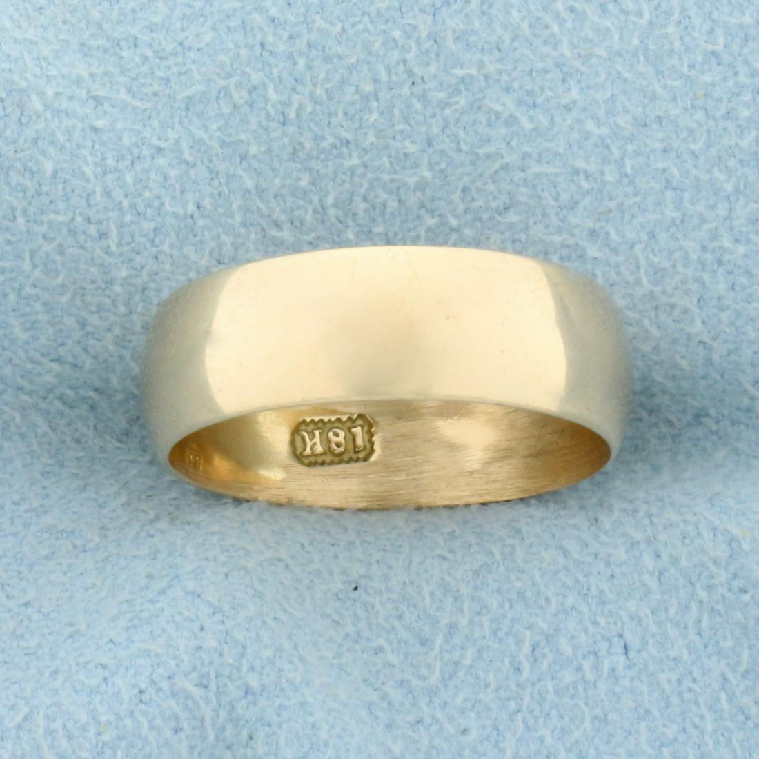 Wedding Band Ring in 18K Yellow Gold: In 18K Yellow Gold. Size 7 3/4. 6.2mm wide. 3.7g