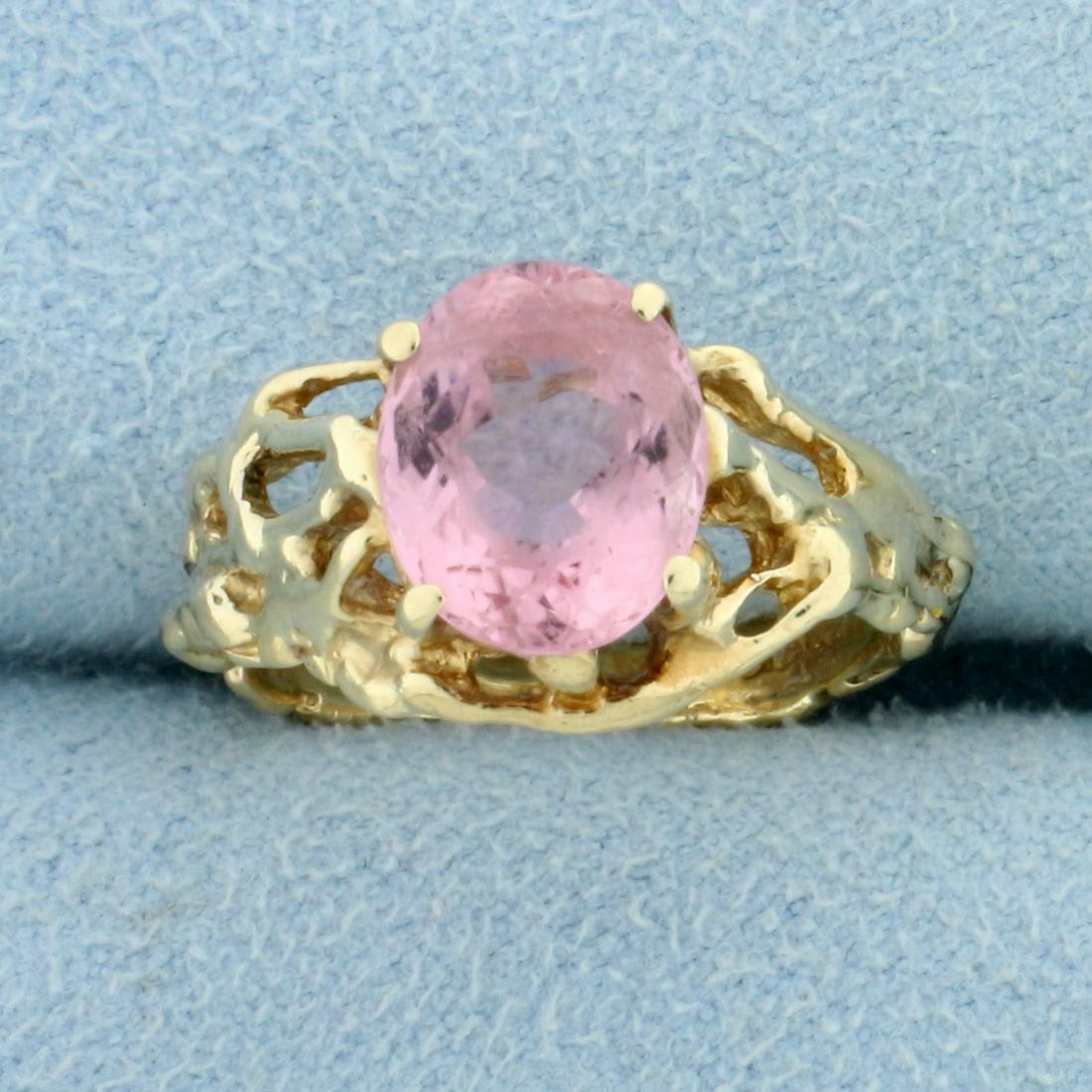 3ct Morganite Solitaire Ring in 14K Yellow Gold: In 14K Yellow Gold. Contains one high quality natural 10 x 8mm Morganite gemstone with bright salmon pink color and excellent clarity. Size 6 1/2. 4.5g.