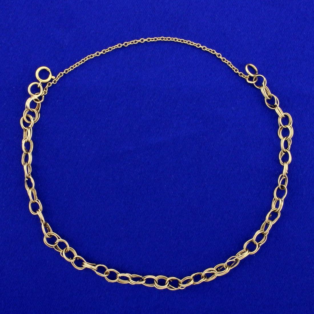 8 Inch Triple Link Bracelet in 14K Yellow Gold: In 14K Yellow Gold. 8 inches long, 4.5mm wide. Safety chain. 3.7g.