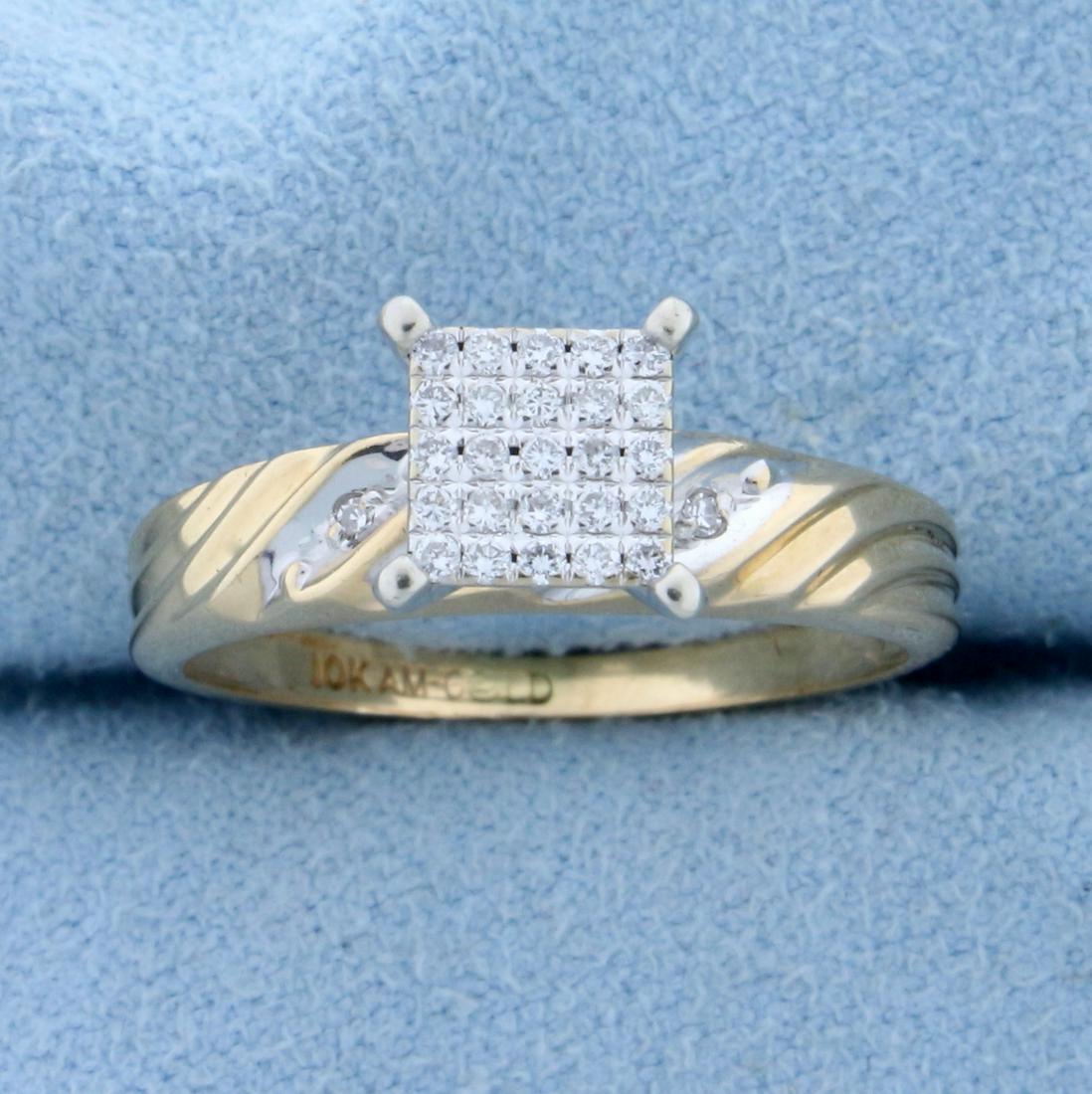 Diamond Engagement Ring in 10K Yellow and White Gold: In 10K Yellow and White Gold. Contains twenty five high quality 1/2pt round Diamonds forming what looks like a large 3/4ct square solitaire diamond. Also contains two high quality .01ct Diamonds in sh