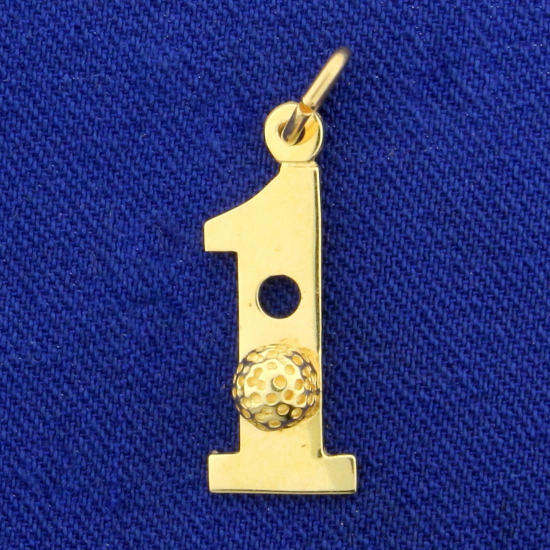 Number "1" Golf Ball Charm or Pendant in 14K Yellow: In 14K Yellow Gold. 1 inch long with bale. 0.9g