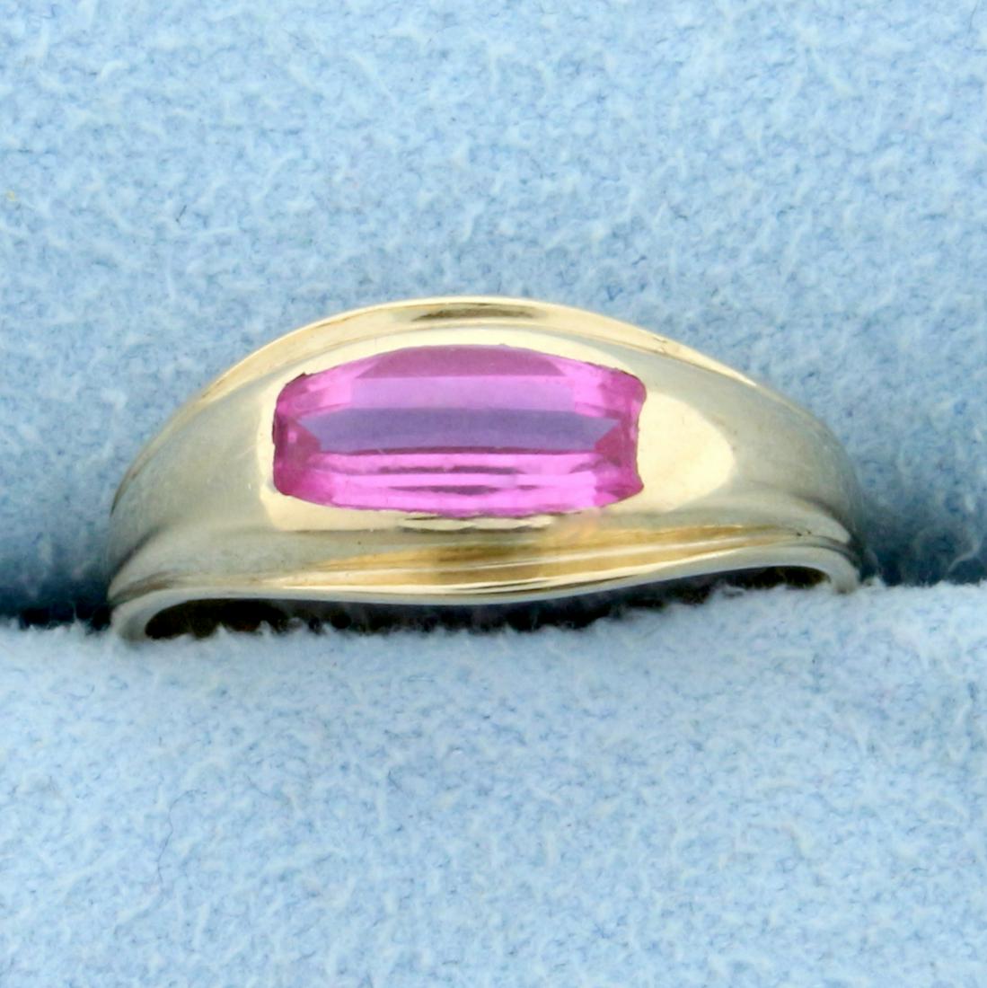 1ct Pink Sapphire Solitaire Ring in 14K Yellow Gold: In 14K Yellow Gold. Contains a high quality 8 x 4mm rectangle Pink Sapphire gemstone with vibrant pink color and excellent clarity. Size 5. 2.3g.