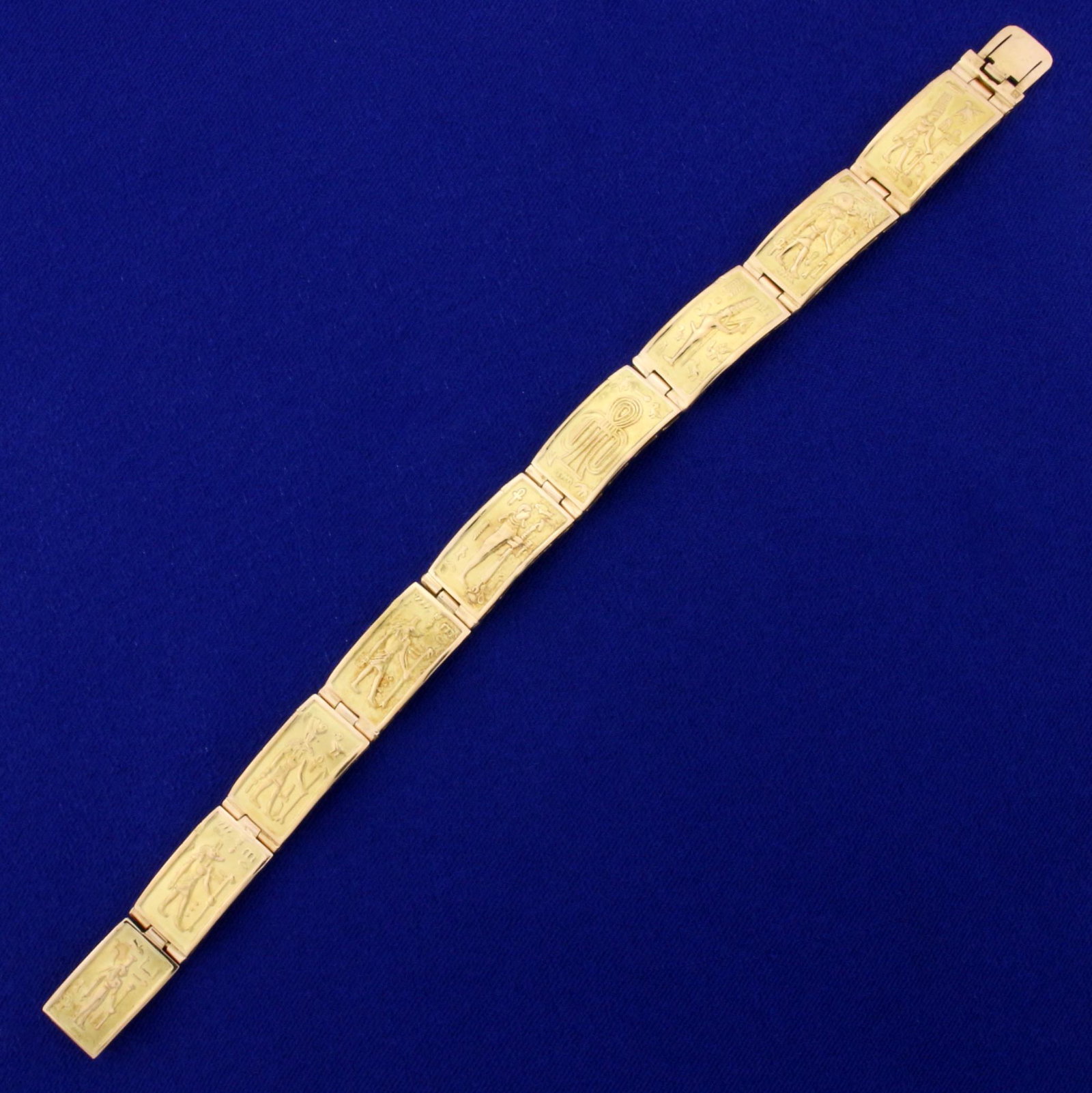 Heavy Ancient Egyptian Gold Link Bracelet in K Yellow: In 18K Yellow Gold. 7 3/4 inches long. 11mm wide. 32.2g