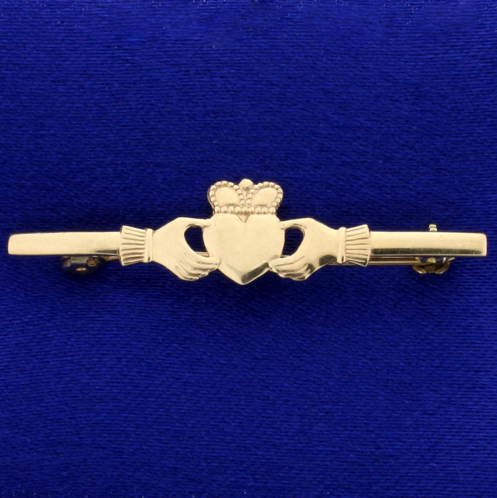 Claddagh Heart Pin in 9K Yellow Gold: In 9K Yellow Gold. 1 9/16 inches long. 1.4g.