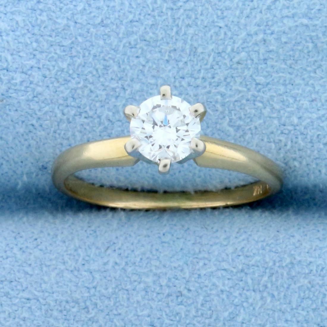 .45ct Solitaire Diamond Engagement Ring in 14k Yellow: In 14k yellow gold. Contains a high quality .45ct diamond held by six prongs. Diamond is SI clarity/I color, excellent cut with lots of sparkle and brilliance Size 4 1/2. 1.8g.