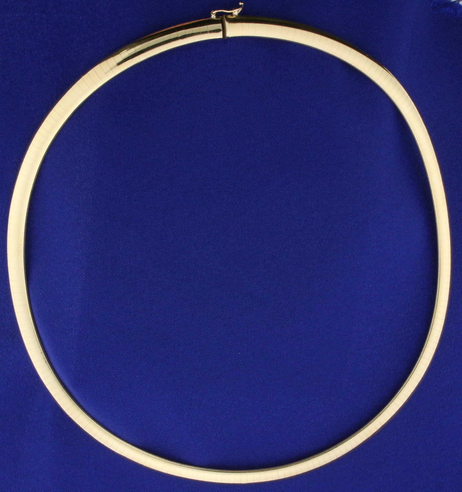 18 Inch Omega Necklace in 14K Yellow Gold: In 14K Yellow Gold. 18 inches long, 6mm wide. 36.8g.