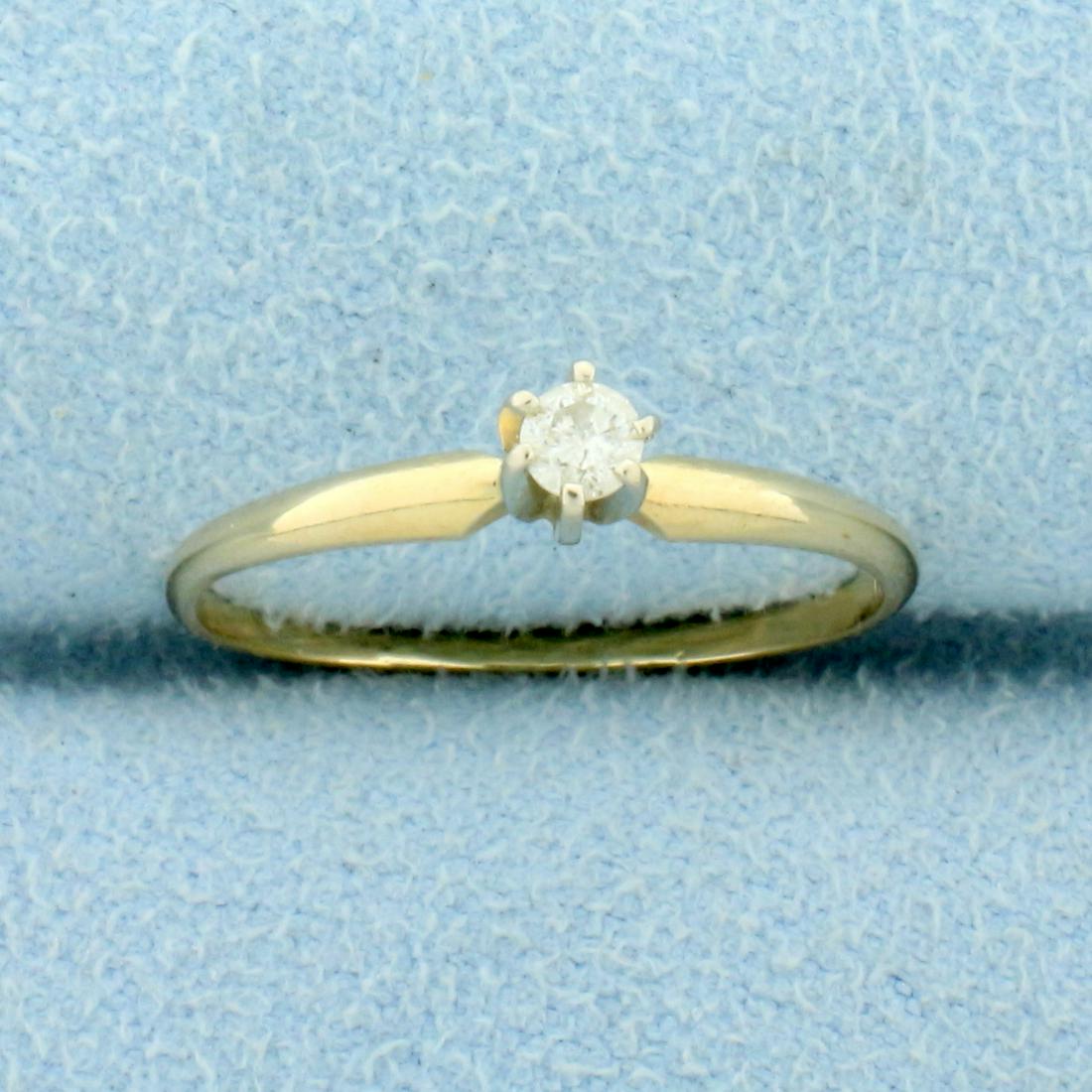 Diamond Solitaire Engagement Ring in 14k Yellow Gold: In 14k Yellow Gold. Contains one high quality .1ct round Diamond, I1 clarity/I color. Size 5 3/4. 1.1g