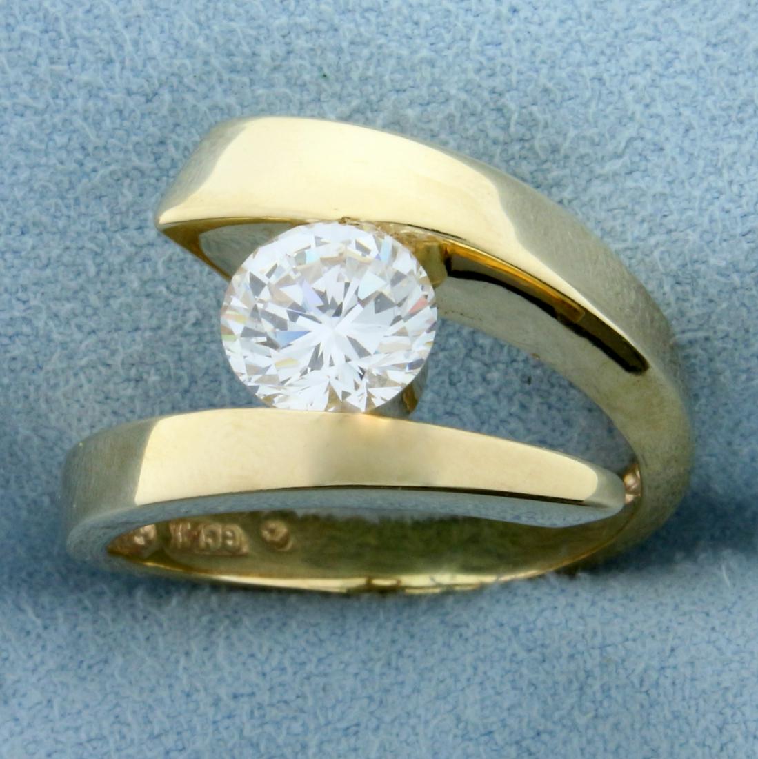 1.5ct CZ Solitaire Ring in 14k Yellow Gold: In 14K Yellow Gold. Contains one high quality 1.5ct round brilliant cut CZ gemstone with lots of sparkle and excellent clarity. Size 8 3/4. 8.9g.
