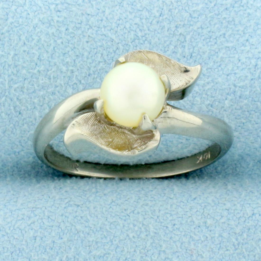 Cultured Pearl Solitaire Ring in 10K White Gold: In 10K White Gold. Contains one high quality 6.2mm Cultured Pearl with beautiful cream color and high luster. Size 7. 3.3g.