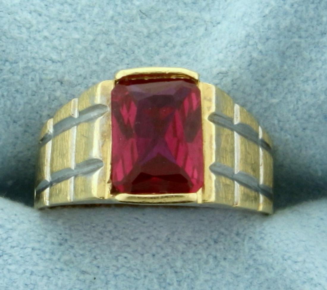 1.5ct Solitaire Ruby Ring in 14K Yellow and White Gold: In 14K Yellow and White Gold. Contains an 8x6mm emerald cut Ruby gemstone with beautiful vibrant ruby red color and excellent clarity. Size 4 1/4. 2.9g