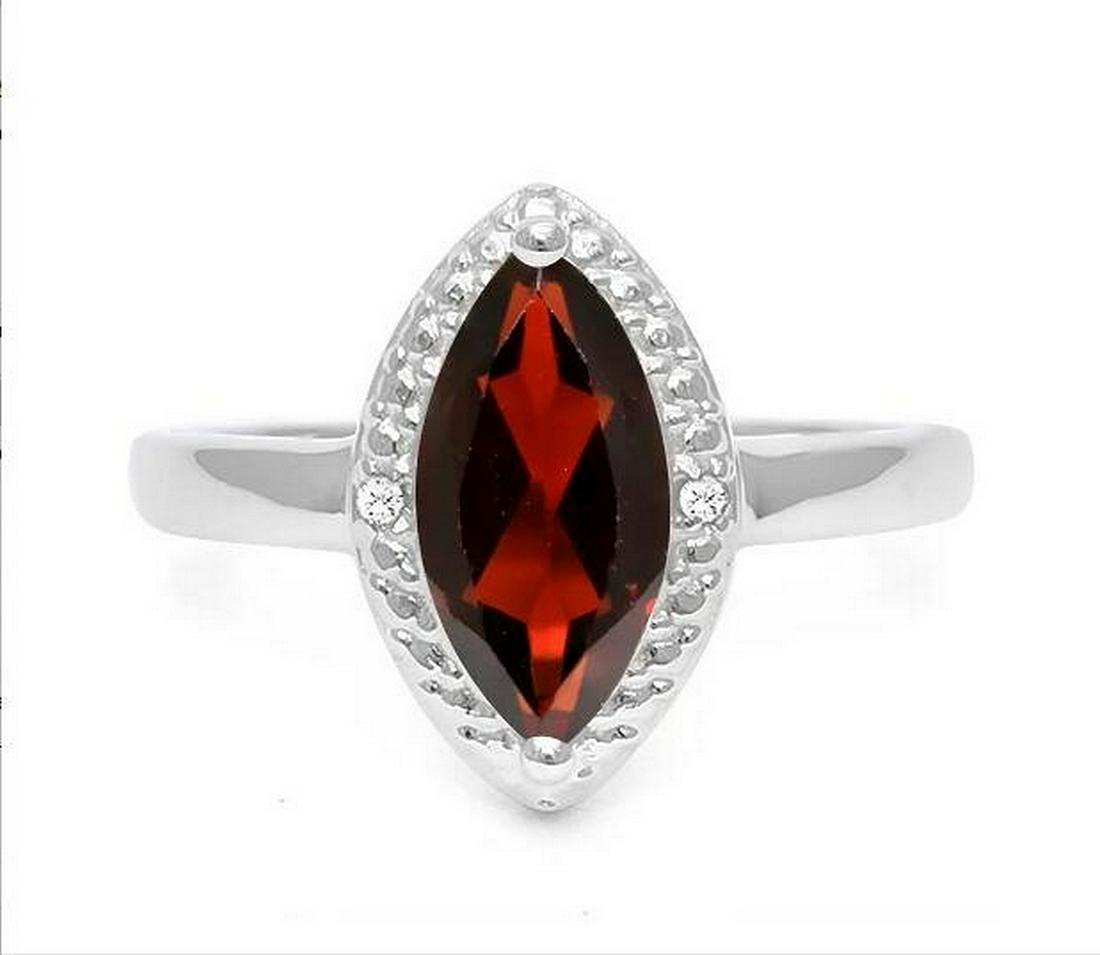 Large 1.9CT Garnet & Diamond Ring in Sterling Silver: Marquise cut 1.9ct garnet gemstone ring, accented with .01ctw genuine diamonds. Size 6. Set in platinum over sterling silver, 3.1g.