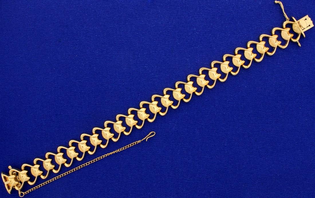 Heavy 18K Rose Gold Designer Link Bracelet: In 18K Rose Gold. 7" long, with safety clasp and chain. 13mm wide. 22.3g