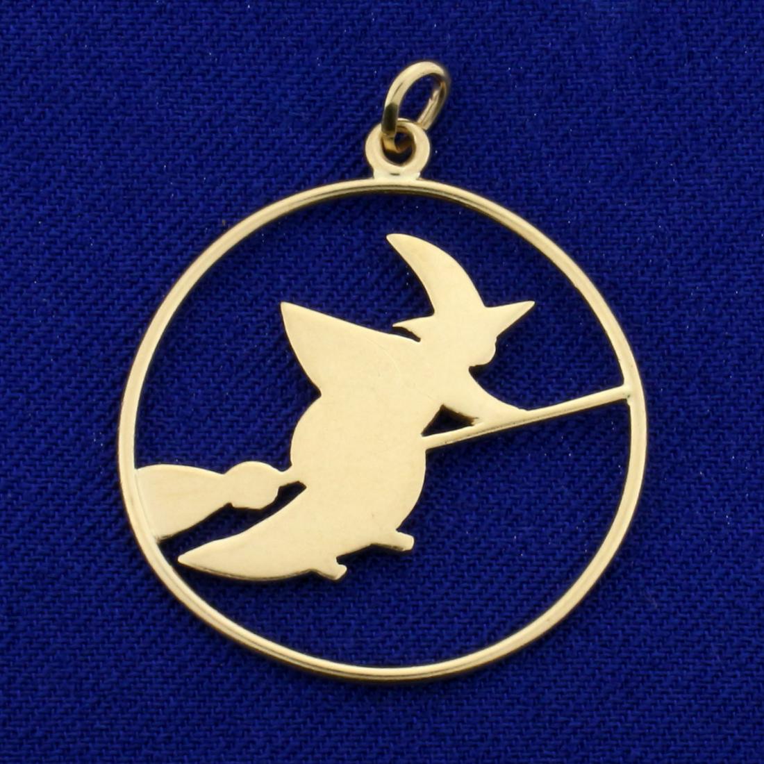 Witch on Broomstick Pendant in 14K Yellow Gold: In 14K Yellow Gold. 1 1/4 inches long, 1 inch wide. 2.6g.