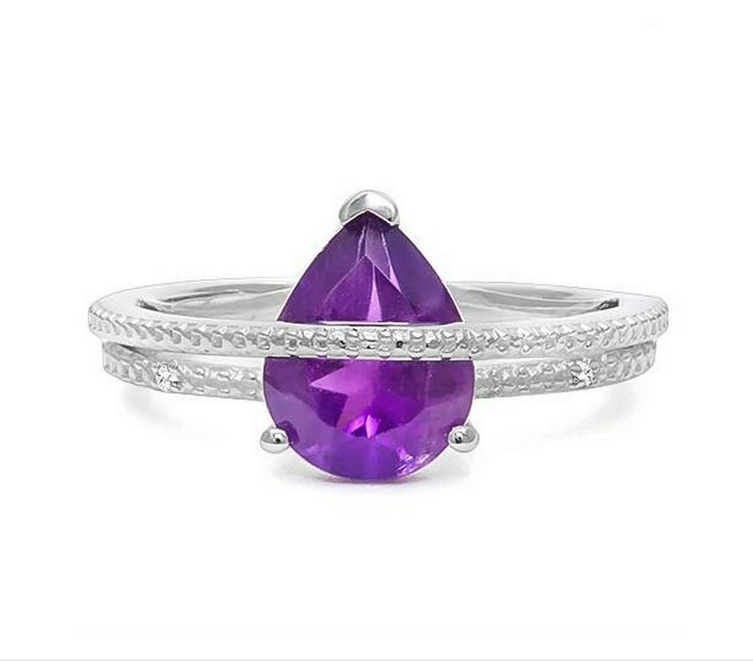 2CT Pear Cut Amethyst & Diamond Ring in Sterling Silver: Pear cut 2.04ct amethyst gemstone ring, accented with .01ctw genuine diamond. Size 8. Set in platinum over sterling silver, 3.3g.