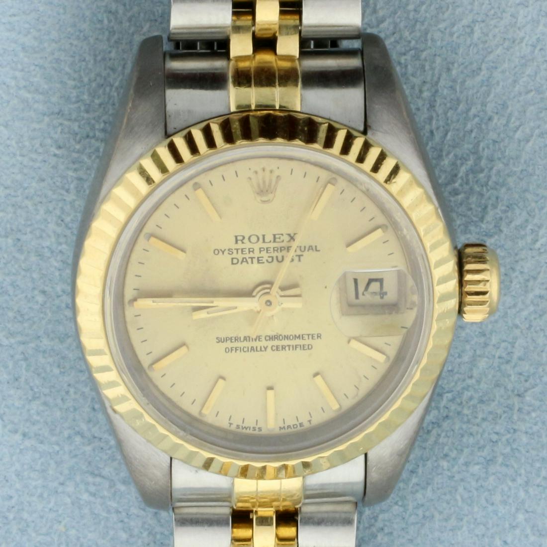 Ladies Rolex Datejust Jubilee Watch: In Stainless Steel and 18k Yellow Gold. 26mm face. Automatic Movement was just serviced and runs great. 18k Gold fluted bezel. Beautiful champagne colored dial. Some stretch to Jubilee band, no scratc