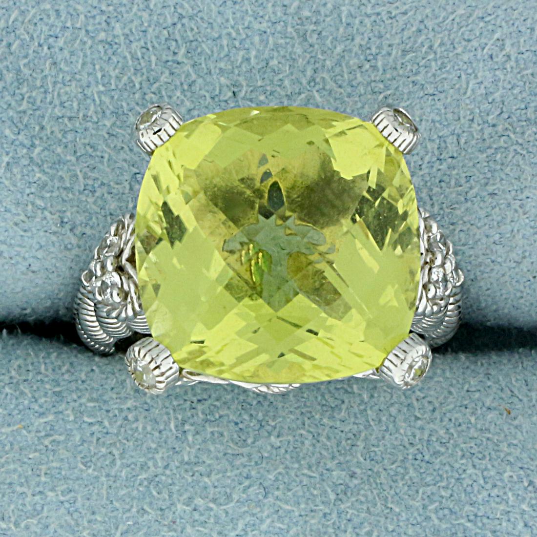 Judith Ripka Designer Lemon Quartz Ring in Sterling: In Sterling Silver. Contains one high quality natural 15mm checkerboard cut Lemon Topaz gemstone with vibrant color and excellent clarity. Also contains ten high quality natural 2mm round CZ gemstones