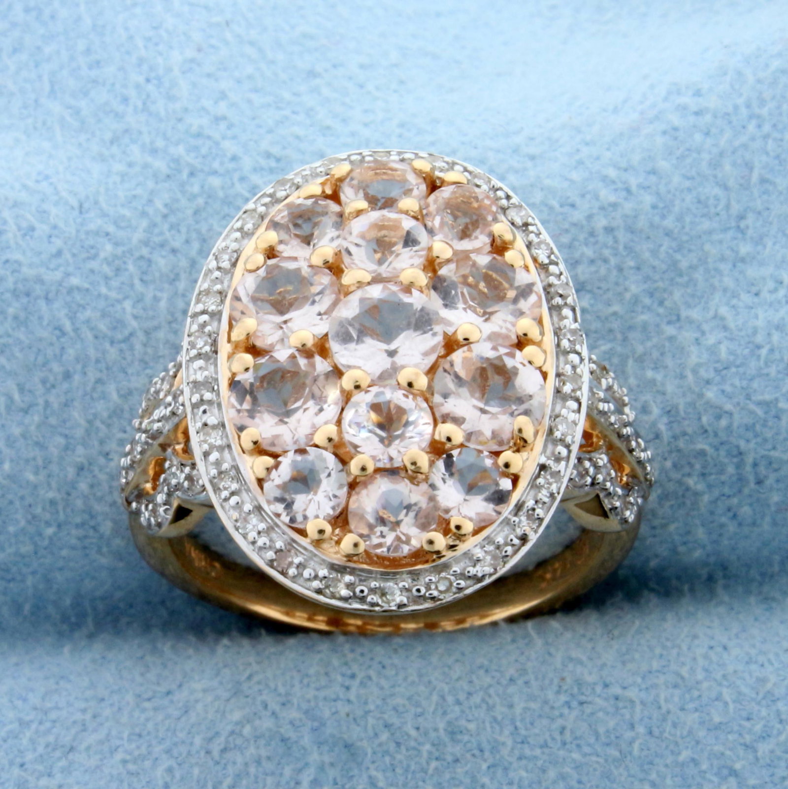 Natural Morganite and Diamond Ring in 14K Rose Gold: In 14K Rose Gold. Contains five 4.5mm and eight 3mm High Quality Natural Morganite gemstones with beautiful pink salmon color and excellent clarity. Also contains fifty 1/2pt Diamonds. Size 8. 6.8g.