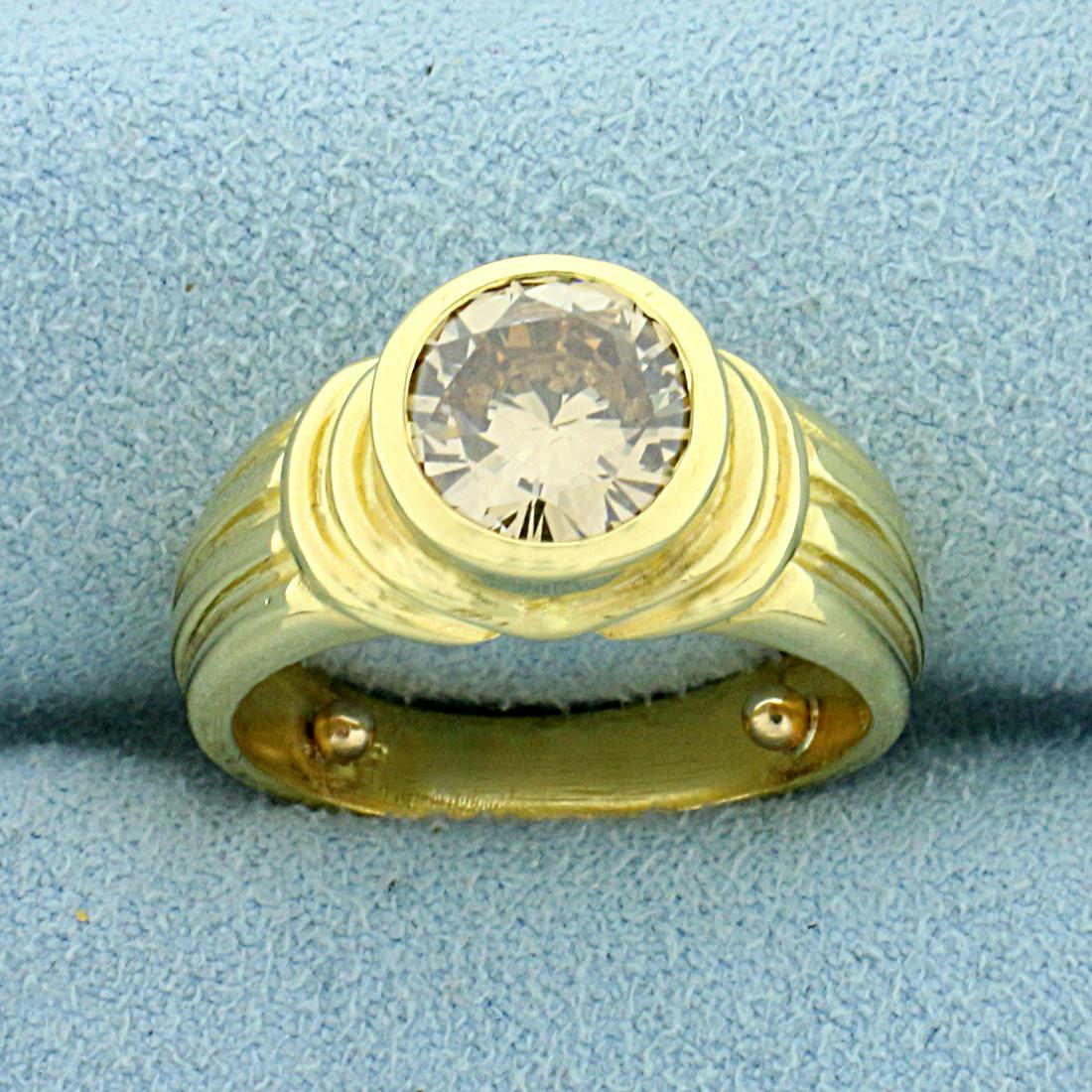 2ct Champagne Diamond Solitaire Ring in 18K Yellow Gold: In 18K Yellow Gold. Contains one high quality natural 2ct Champagne Diamond with beautiful warm color and excellent clarity. Size 6 1/2. Stability balls in shank. 8.5g