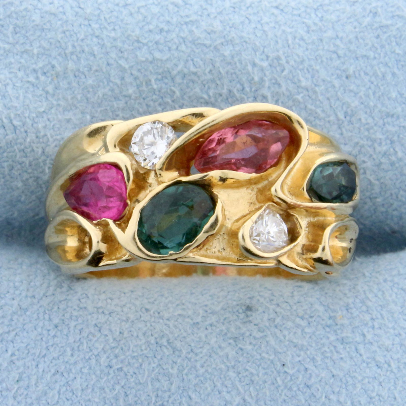 Emerald, Morganite, Diamond, and Rubellite Custom: In 14K Yellow Gold. Contains two brilliant cut 1/8ct Diamonds , VS clarity/G color. Also contains one 6.5mm and one 5.5mm oval natural Emeralds, one 7.5mm Morganite, and one 6mm Rubellite gemstones - 