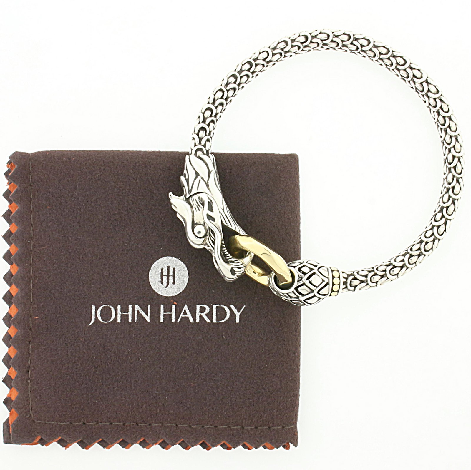 John Hardy Dragon Bracelet in 18K Yellow Gold and: In 18K Yellow Gold and Sterling Silver. 8 inches long, 7mm wide. 37.8g.