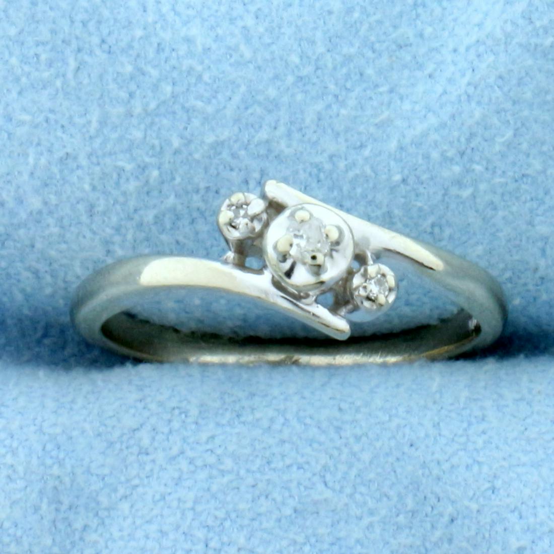 Three-Stone Diamond Wedding or Anniversary Ring in 14K: In 14K White Gold. Contains a high quality .02ct and two high quality 1/2pt Diamonds. Size 5 1/2. 2.0g