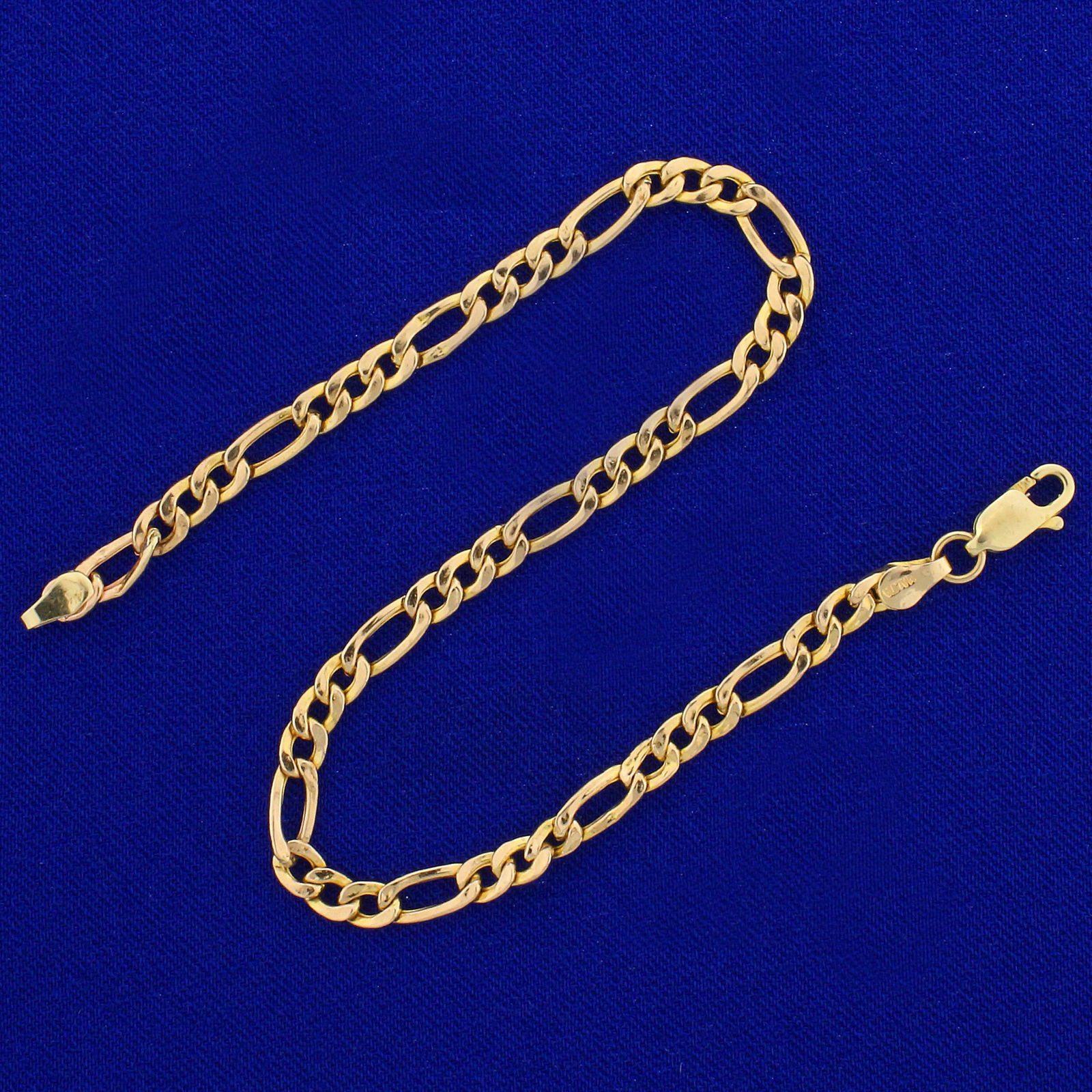 Figaro Link Anklet in 14K Yellow Gold: In 14K Yellow Gold. 8 1/2 inches long. 4mm wide. Lobster clasp. 3.2g