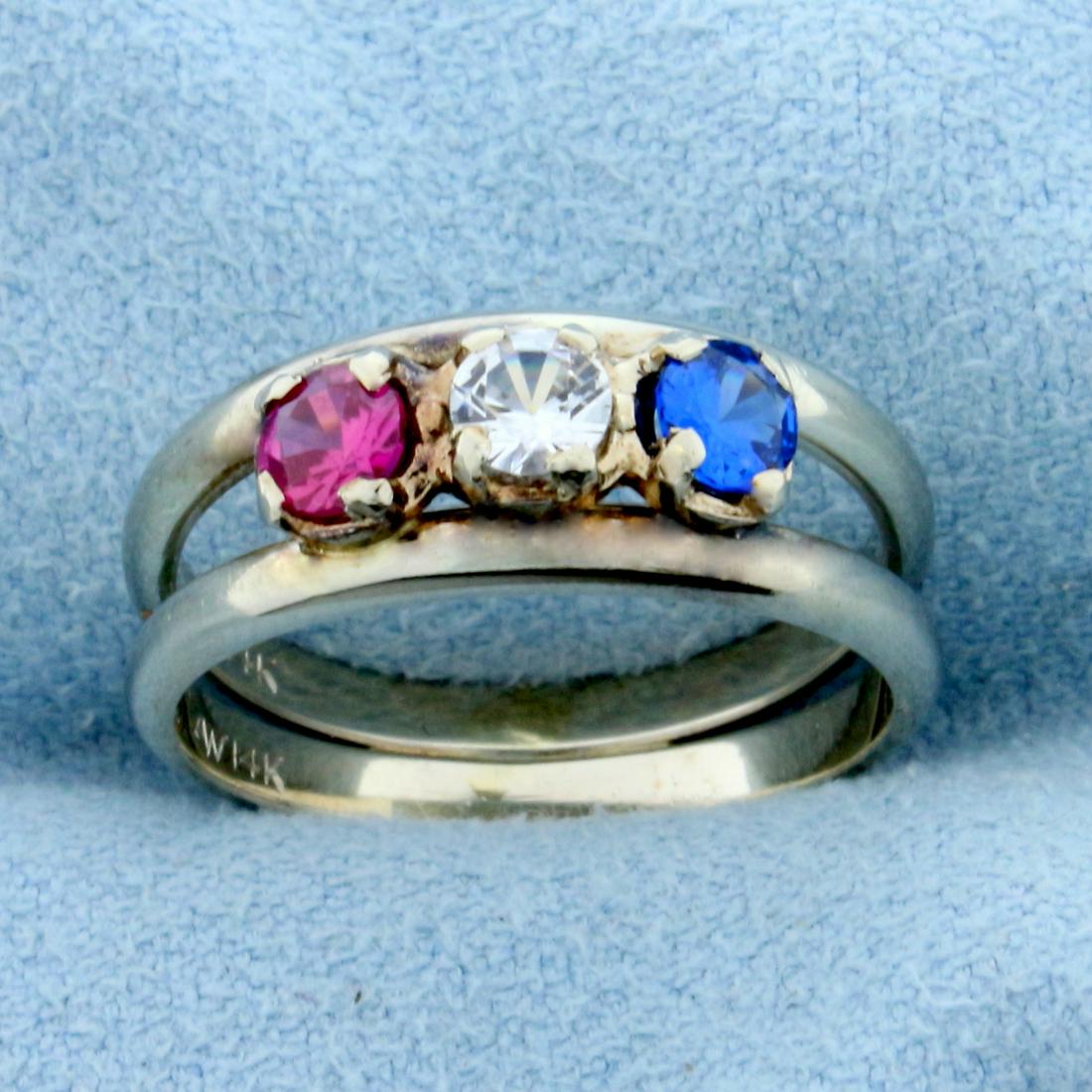 Ruby, White Sapphire, and Blue Spinel Gemstone Ring in: In 14K White Gold. Contains one high quality natural .2ct White Sapphire, one high quality natural .2ct Spinel, and one high quality .2ct Ruby, all with bright color and excellent clarity. Size 6. 3.6