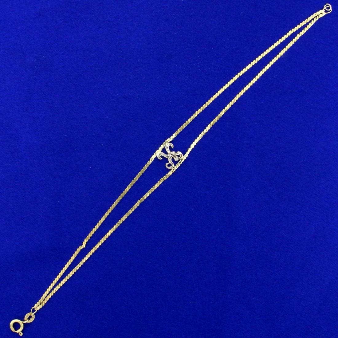 Italian-Made Diamond Initial "K" S-Link Bracelet in 14K: In 14K Yellow Gold. Contains eight high quality natural 1/2pt Diamonds. 7 1/2 inches long. Chain is 1.4mm thick. 2.8g