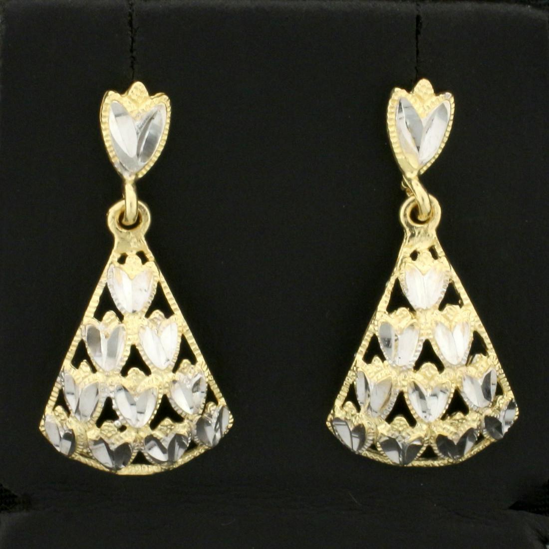 Dangle Heart Chandelier Earrings in 14K Yellow and: In 14K Yellow and White Gold. 1 inch long, 1/2 inch wide. Friction backs. 3.2g.