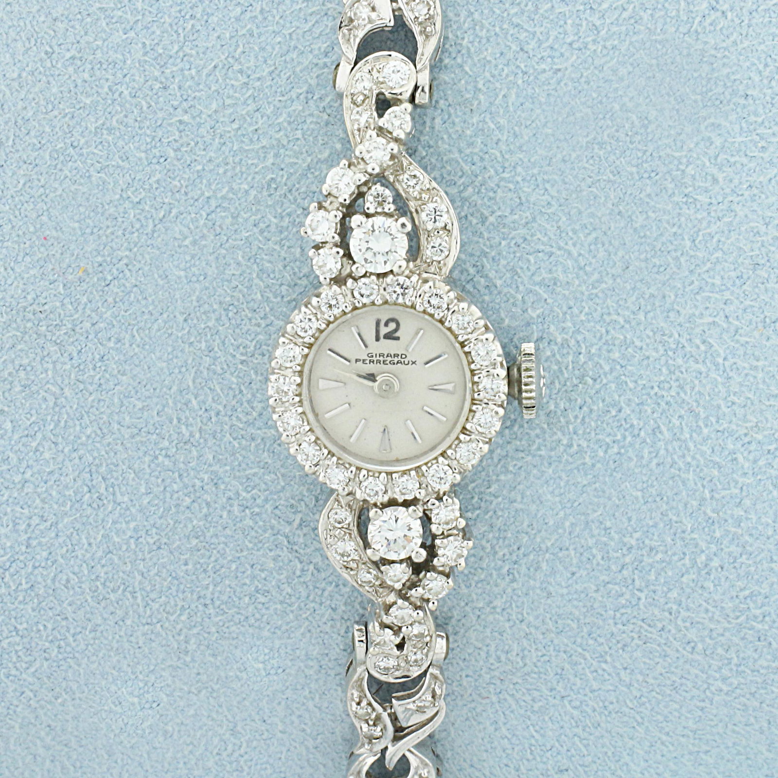 Ladies Vintage Diamond Girard Perregaux Windup Watch in: In 14K White Gold. Windup movement runs great. Inside case stamped "B2013" and "51324". Watch is in great condition for age, no scratching on crystal, minimal scratching on case. 6 inches long, case i