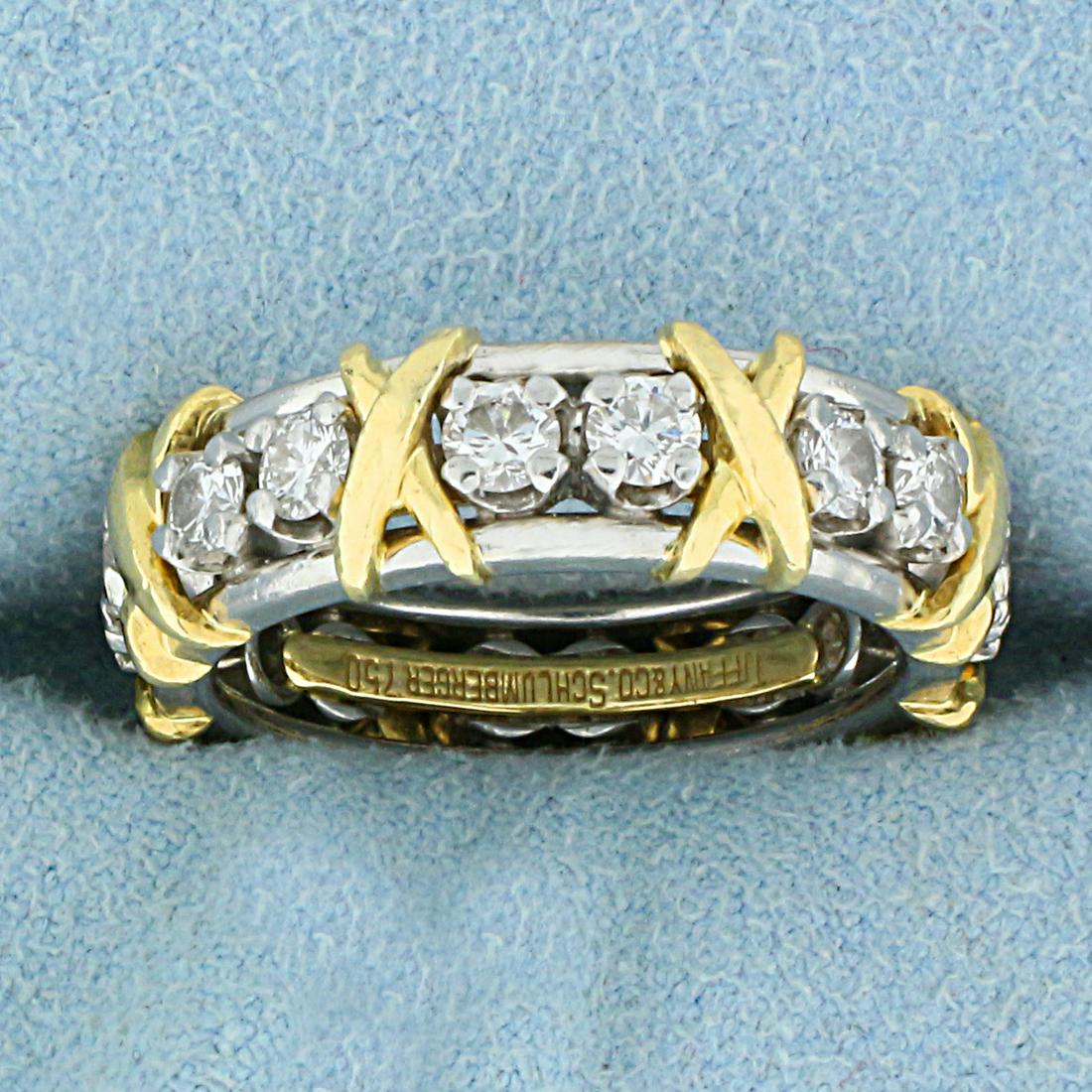 Tiffany Schlumberger Sixteen Stone Diamond Ring in: In Platinum and 18K Yellow Gold. Includes original box and all paperwork including purchase receipt. Ring contains sixteen round brilliant Diamonds, 1.18 CTW, VS Clarity/F color. 6.4mm wide. Size 6.5.
