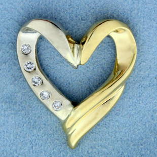 Diamond Heart Pendant or Slide in 18K Yellow and White: In 18K Yellow and White Gold. Contains five high quality .02ct round brilliant cut Diamonds, SI clarity/H color. 1 inch long. 6.3g.