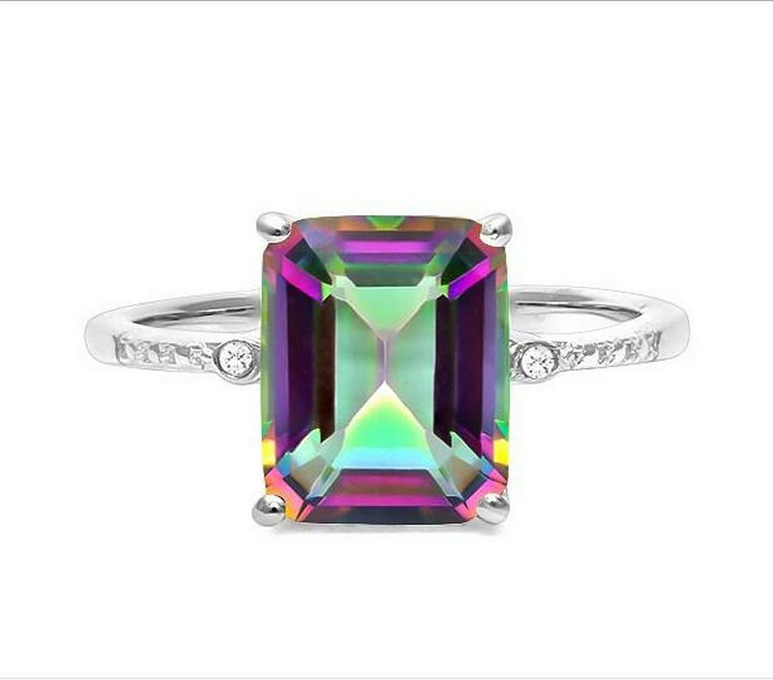 3CT Mystic Topaz & Diamond Ring in Sterling Silver: Emerald cut 3ct mystic topaz gemstone ring accented with .01ctw genuine diamonds. Size 8. Set in platinum over sterling silver, 2.5g.