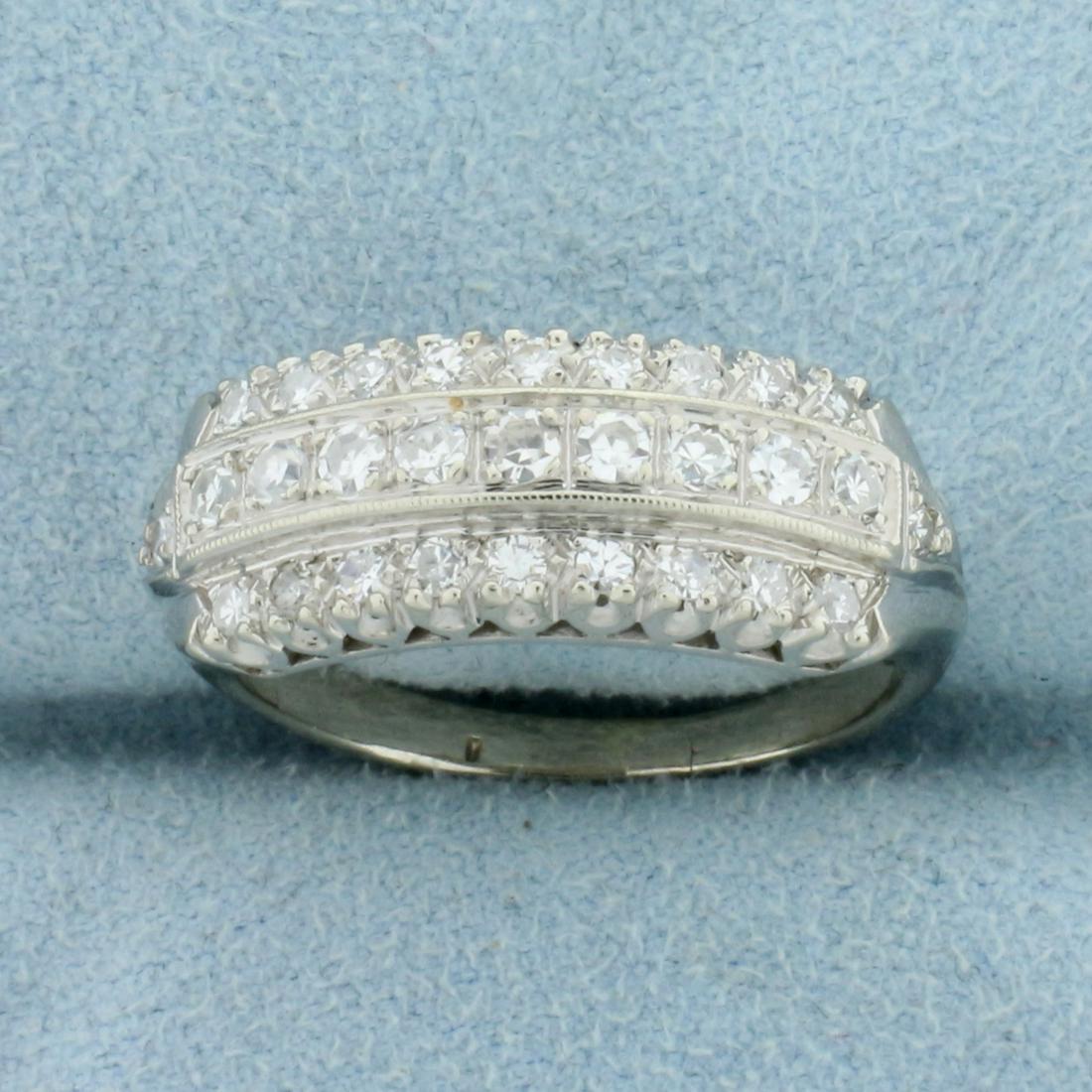 3/4ct TW Diamond Anniversary or Wedding Ring in 14K: In 14K White Gold. Contains nine .04ct and twenty two high quality .02ct high quality Diamonds, VS clarity/G color. Size 8. 5.4g.