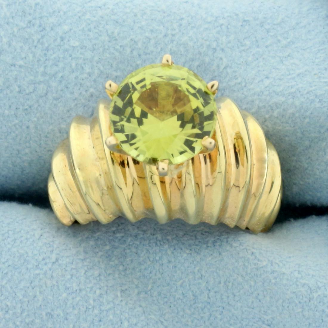 3ct Rare Yellow Chrysoberyl Ring in 14K Yellow Gold: In 14K Yellow Gold. Contains a very high quality natural 9.25mm natural round Yellow Chrysoberyl gemstone with very rare and desirable intense yellow with hint of lime color and excellent clarity. Siz