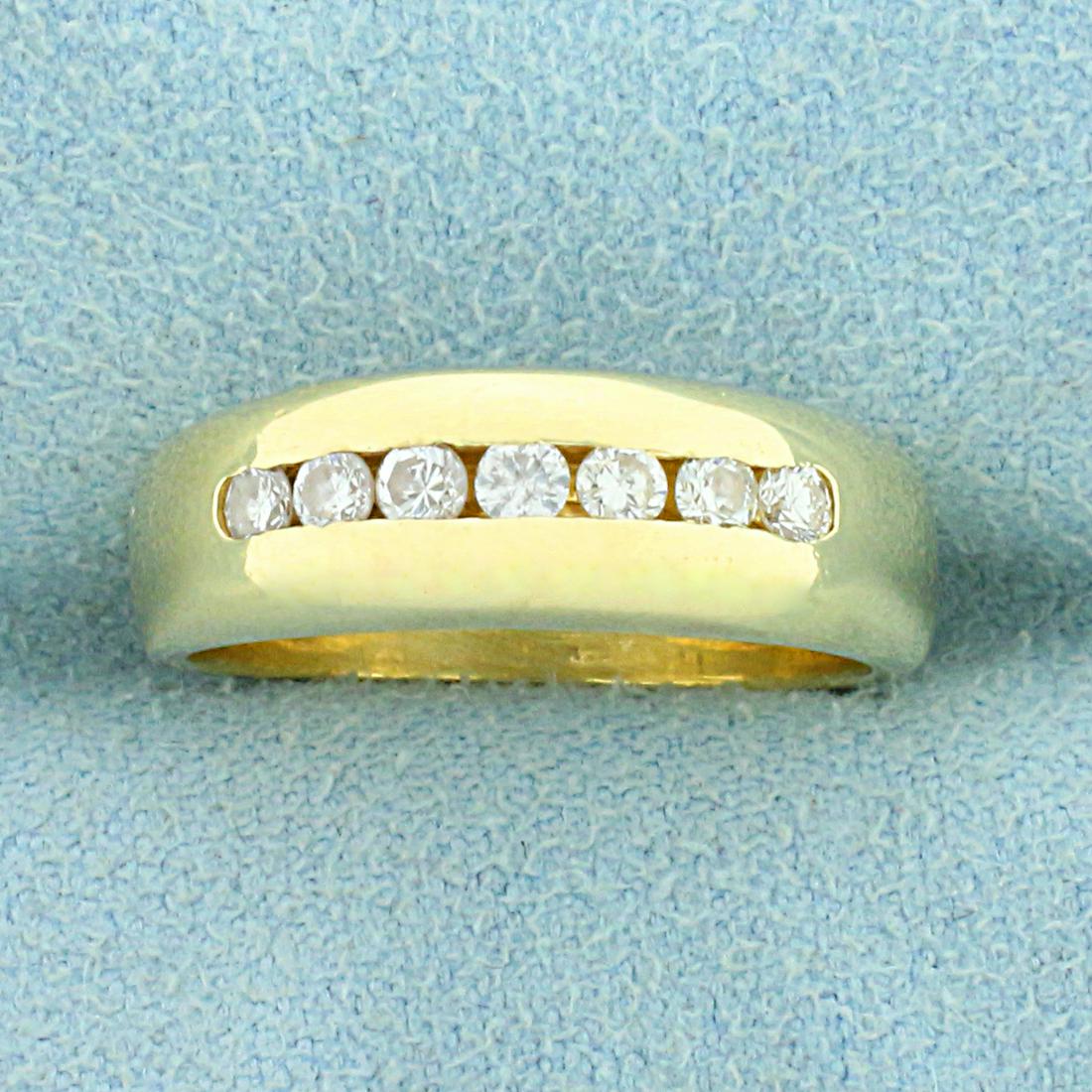 1/4ct TW Diamond Wedding or Anniversary Band Ring in: In 14K Yellow Gold. Contains seven high quality Diamonds, 1/4ct TW, VS clarity/H color. Size 5 1/2. 4.1g