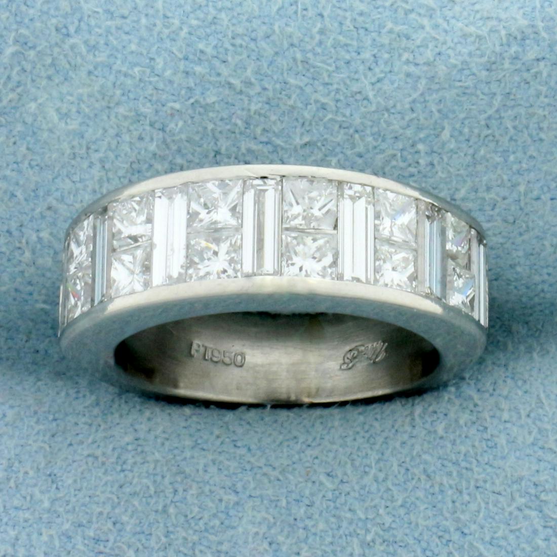 2ct TW Channel Set Princess and Baguette Diamond Ring: In 950 Platinum. Contains twelve very high quality Princess Cut Diamonds and seven very high quality Baguette Diamonds, all F color/VS clarity . Size 5. 9.8g