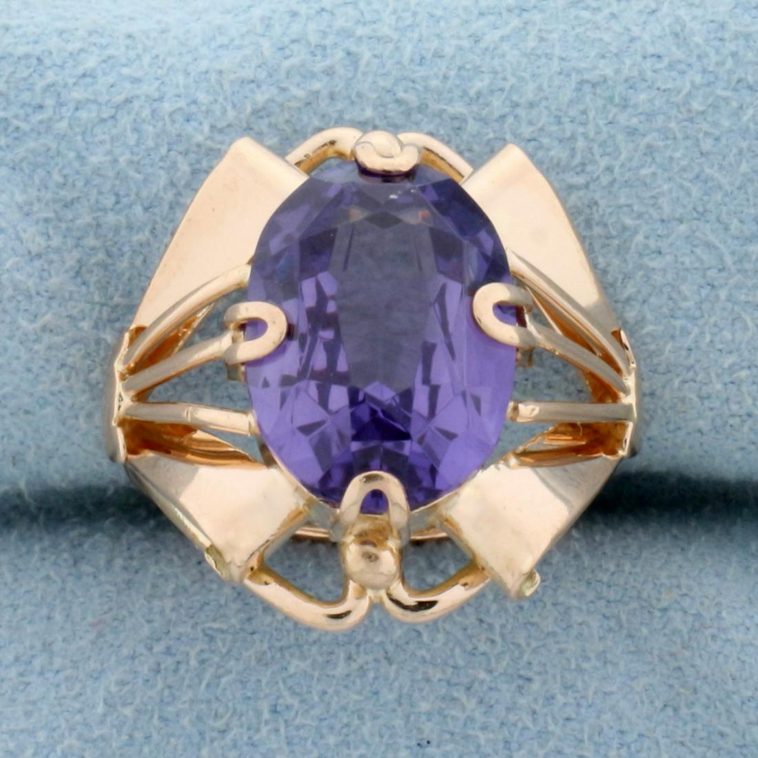 7ct Purple Sapphire Solitaire Ring in 14K Rose Gold: In 14K Rose Gold. Contains a high quality 14x10mm oval cut Purple Sapphire gemstone with vibrant color and excellent clarity. Size 5 1/2. 6.5g