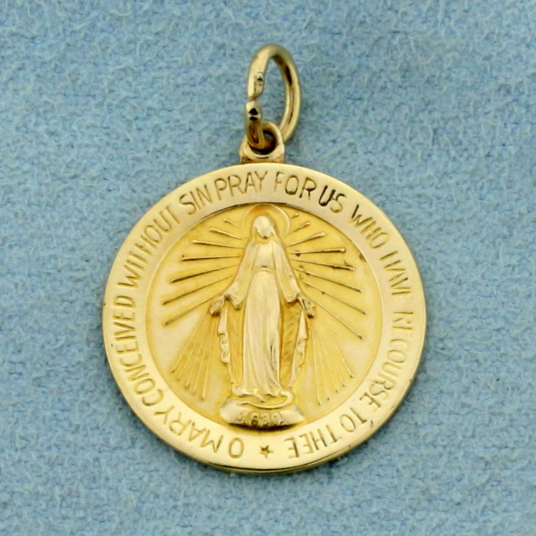 Miraculous Medal or Medal of Our Lady of Grace Pendant: In 14K Yellow Gold. 1 inch long with jump ring. 2.3g.