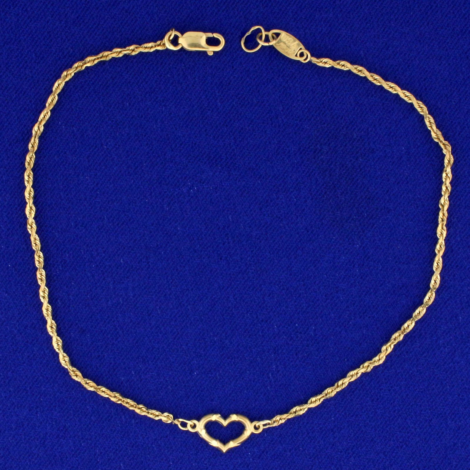 Heart Rope Chain Anklet in 14K Yellow Gold: In 14K Yellow Gold. 9 inches long, with lobster clasp. Chain is 1.7mm wide. 2.6g