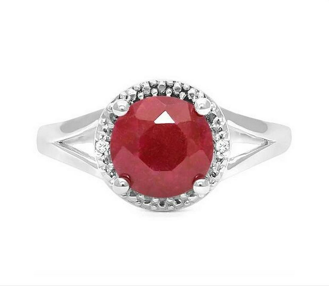 1.8CT Ruby & Diamond Ring in Sterling Silver: Oval cut, rustic 1.8ct genuine ruby gemstone ring accented with .01ct genuine diamonds. Size 7. Set in platinum over sterling silver, 3.0g.