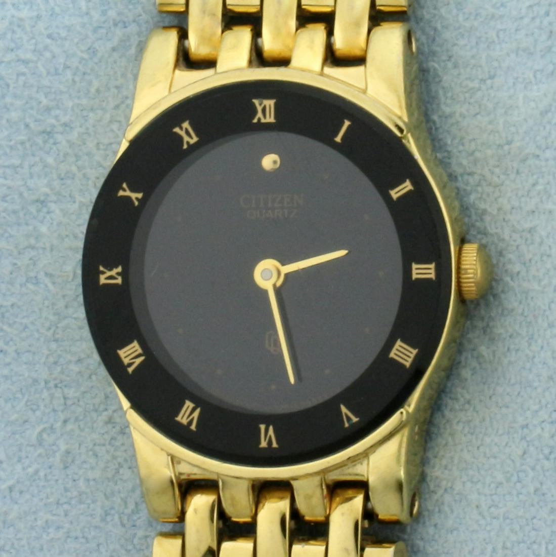 Vintage Womens Citizen Quartz Wrist Watch: In Gold Plated Stainless Steel. Quartz movement runs great, new battery. 6 1/2 inches long. 21mm Case. Minor scratching on crystal, some wear on band. 33.0g