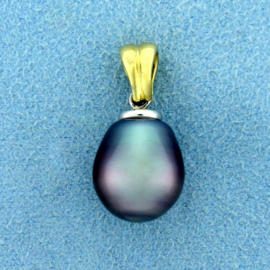 Tahitian Pearl Drop Pendant in 14K Yellow and White: In 14K Yellow and White Gold. Contains one high quality 11mm Tahitian Pearl, with great silver color with peacock undertones and high luster. 7/8 inch long. 3.0g