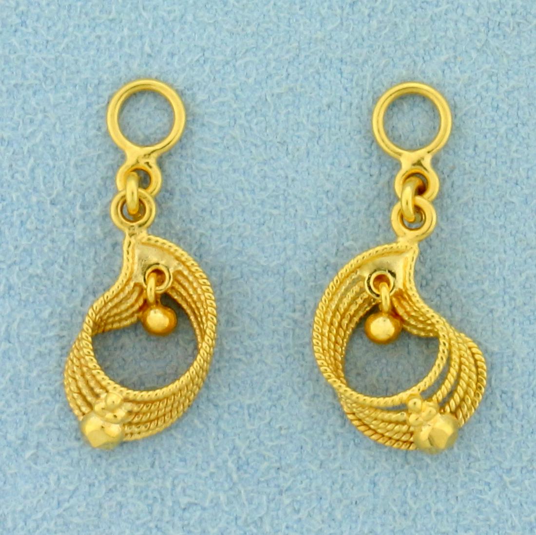 Dangle Stud Earring Enhancers in 22K Yellow Gold: In 22K Yellow Gold. 7/8 inch long, 8mm wide. 2.5g.