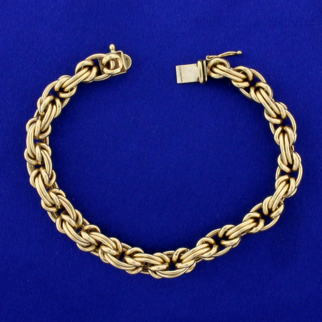 7 1/2 Inch Byzantine Link Bracelet in 14K Yellow Gold: In 14K Yellow Gold. 7 1/2 inches long. 7.6mm wide. Safety clasp. 20.0g