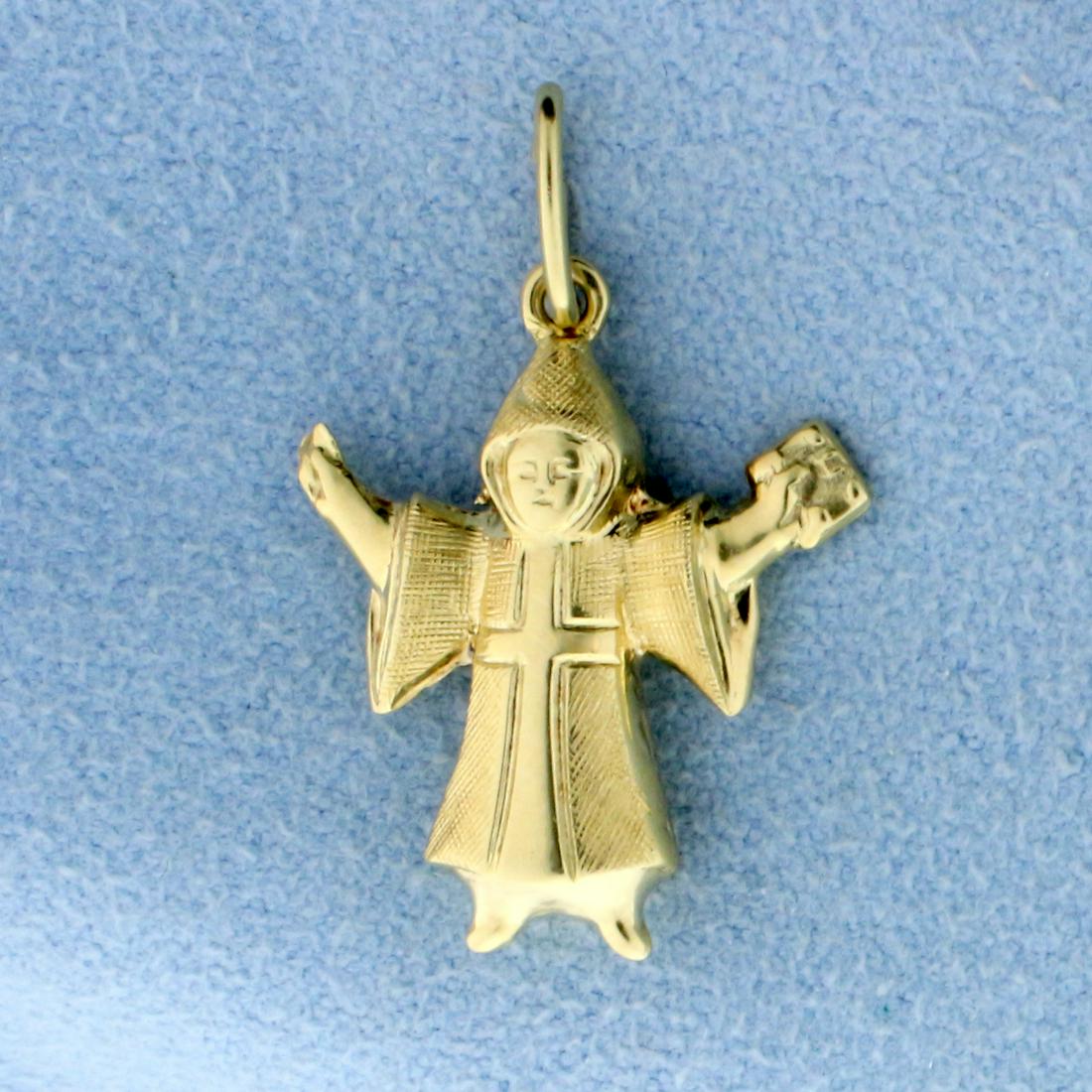 Religious Christian Priest Charm of Pendant in 14K: In 14K Yellow Gold. 1 inch long with jump ring, 1/4 inch wide. 1.0g.